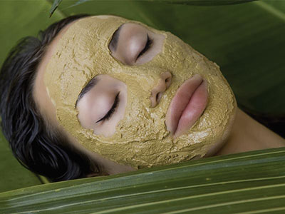 a women having herbal face mask